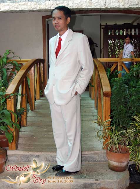 Chateau de Busay Wedding Dress up The Groom in His Suit